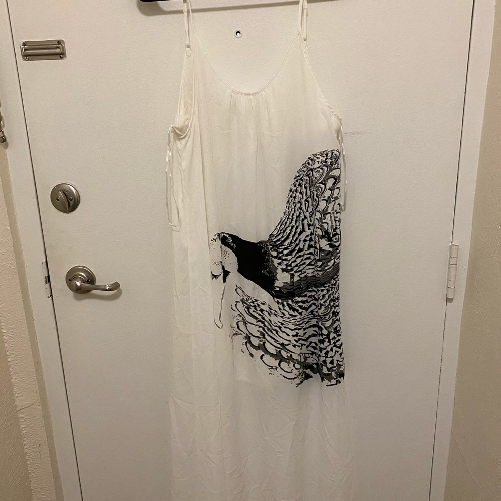 White maxi dress with bird detail